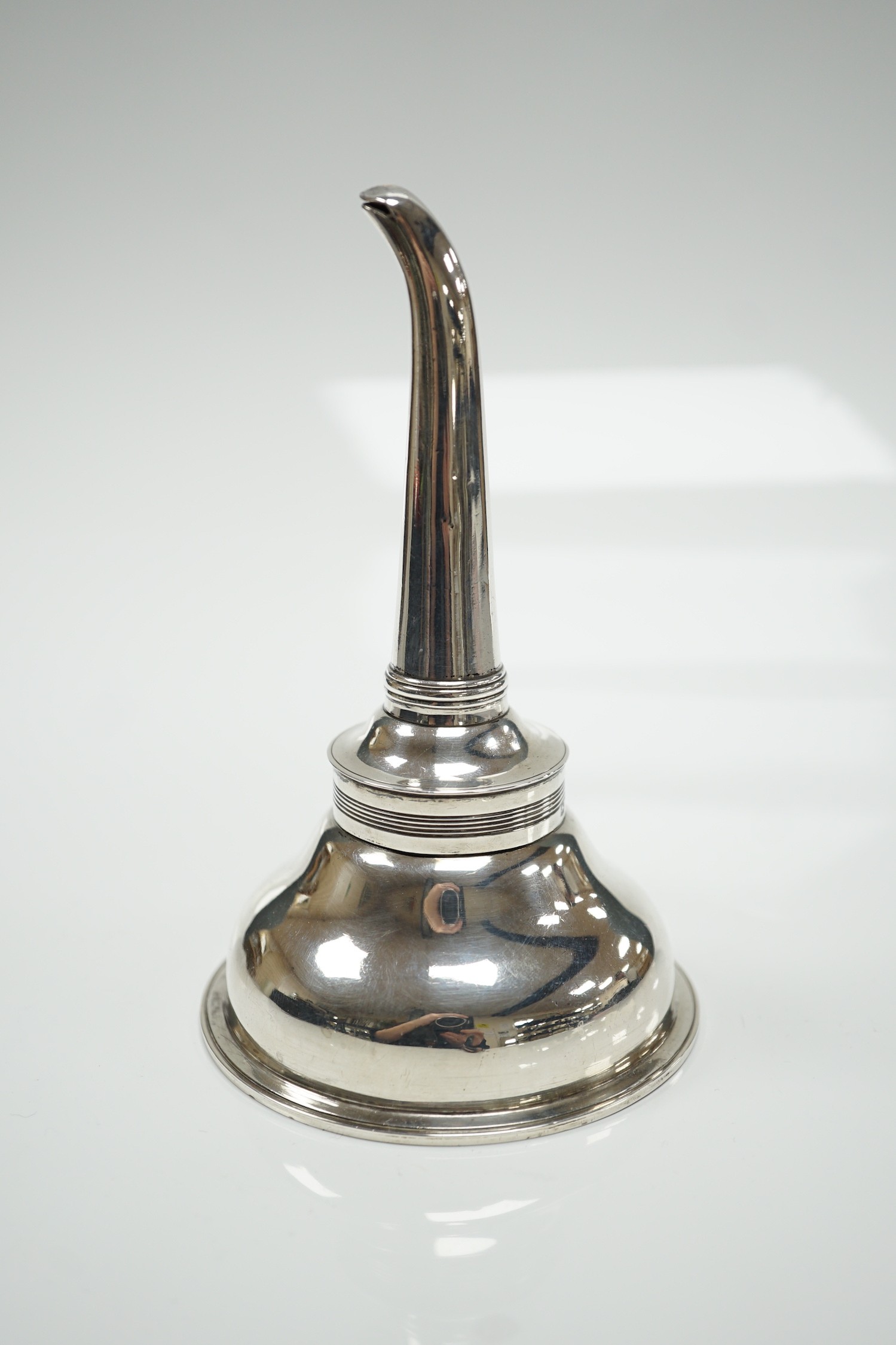 A George III silver wine funnel, Hannah Northcoat?, London, 1799, with muslin ring, 13.7cm, 96 grams.